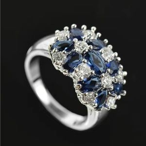Fashion ring, Sapphire and white Topaz, silver plated. US size 7.